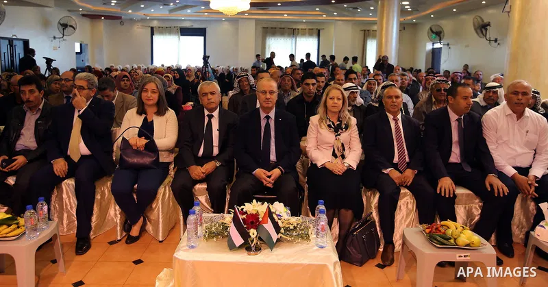 Palestinian Prime Minister Rami al-Hamdallah attends the completion ceremony of the land settlement project of Abu Falah village in the West Bank city of Ramallah on March 30, 2017. Photo by Prime Minister Office