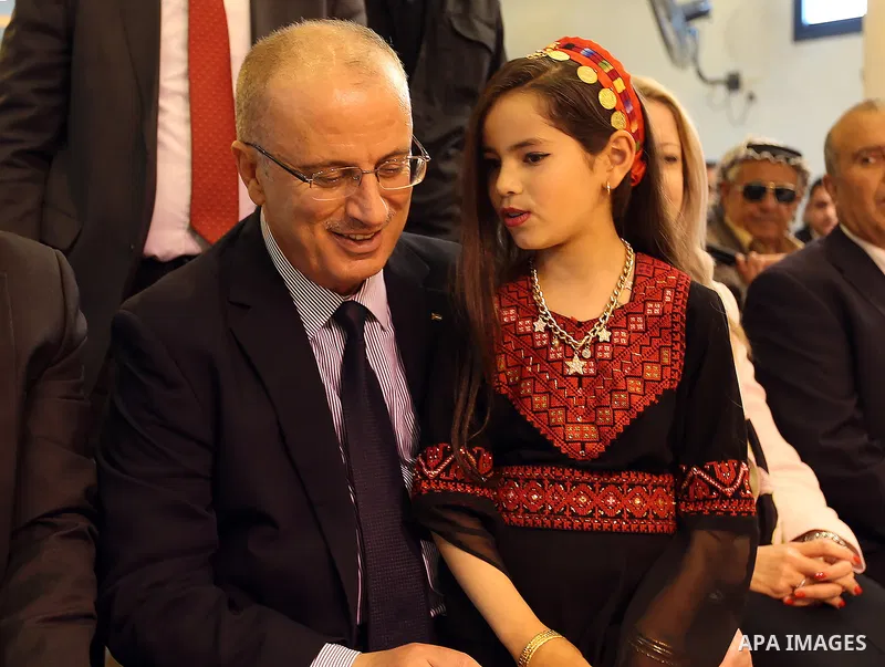 Palestinian Prime Minister Rami al-Hamdallah attends the completion ceremony of the land settlement project of Abu Falah village in the West Bank city of Ramallah on March 30, 2017. Photo by Prime Minister Office