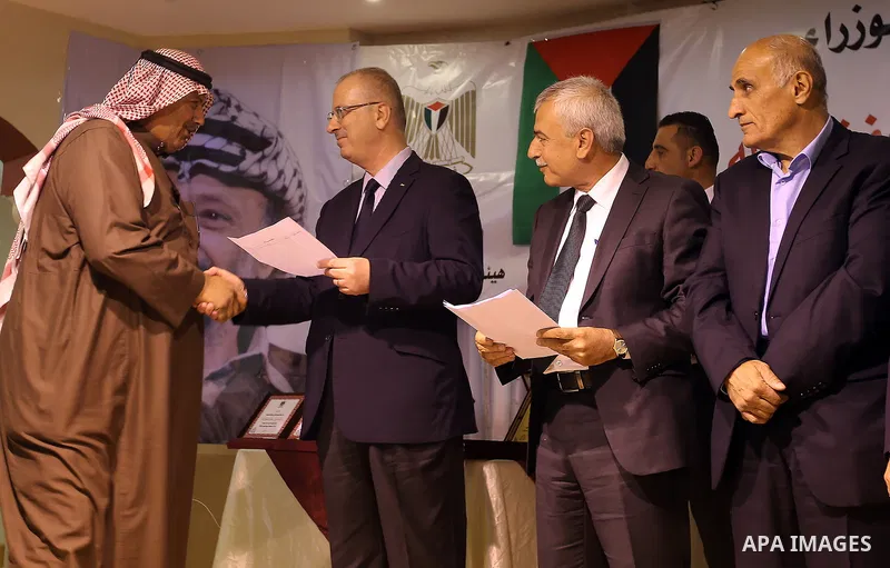 Palestinian Prime Minister Rami al-Hamdallah attends the completion ceremony of the land settlement project of Abu Falah village in the West Bank city of Ramallah on March 30, 2017. Photo by Prime Minister Office