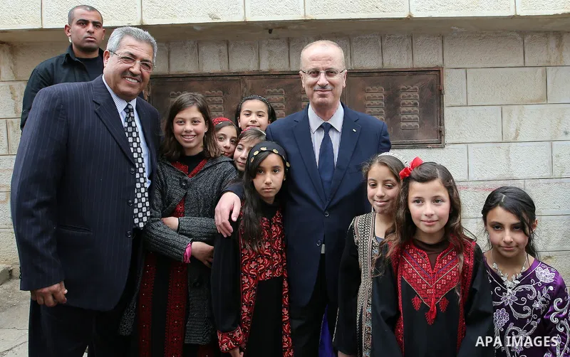 Palestinian Prime Minister Rami al-Hamdallah attends the completion ceremony of the land settlement project of Abu Falah village in the West Bank city of Ramallah on March 30, 2017. Photo by Prime Minister Office