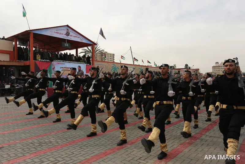 Palestinian police officers loyal to Hamas take part in a graduation ceremony in Gaza City March 30, 2017. Photo by Ashraf Amra