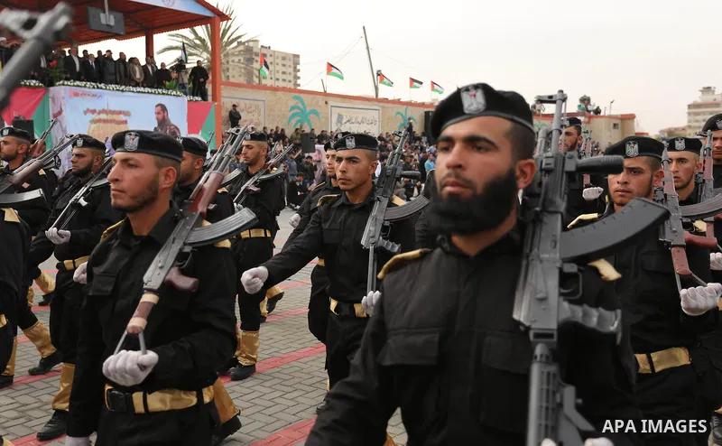 Palestinian police officers loyal to Hamas take part in a graduation ceremony in Gaza City March 30, 2017. Photo by Ashraf Amra