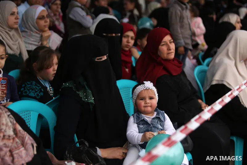 Palestinian police officers loyal to Hamas take part in a graduation ceremony in Gaza City March 30, 2017. Photo by Ashraf Amra