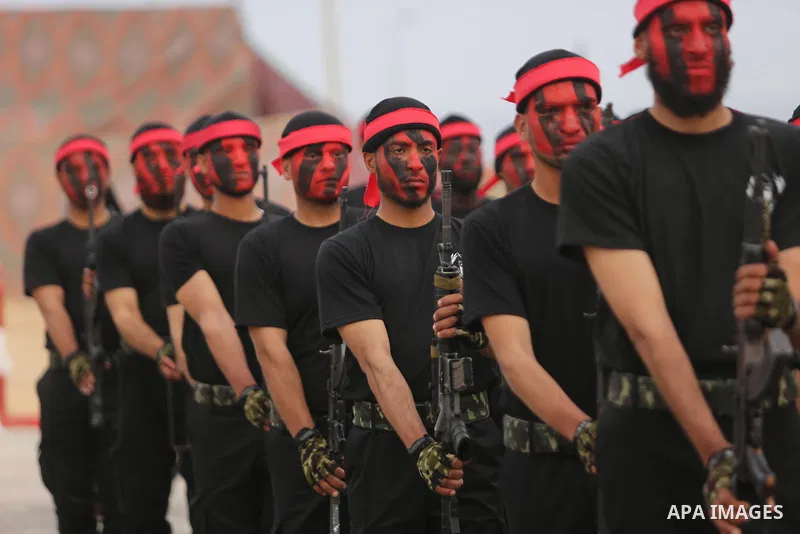 Palestinian police officers loyal to Hamas take part in a graduation ceremony in Gaza City March 30, 2017. Photo by Ashraf Amra
