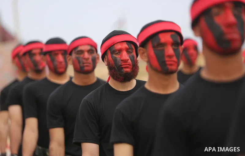 Palestinian police officers loyal to Hamas take part in a graduation ceremony in Gaza City March 30, 2017. Photo by Ashraf Amra