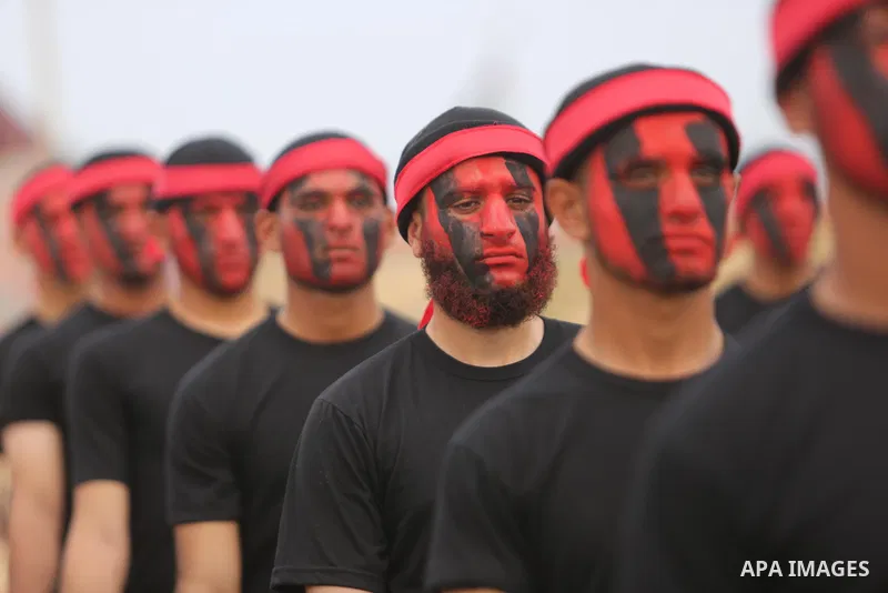 Palestinian police officers loyal to Hamas take part in a graduation ceremony in Gaza City March 30, 2017. Photo by Ashraf Amra