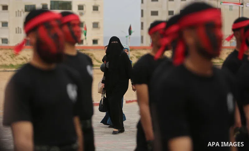 Palestinian police officers loyal to Hamas take part in a graduation ceremony in Gaza City March 30, 2017. Photo by Ashraf Amra