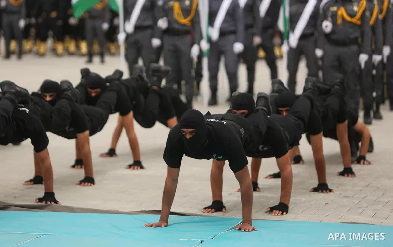 Palestinian police officers loyal to Hamas take part in a graduation ceremony in Gaza City March 30, 2017. Photo by Ashraf Amra