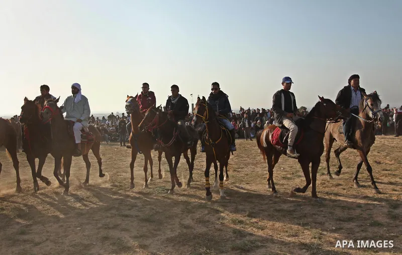 Palestinian Bedouins ride horses during a rally marking the 41st anniversary of Land Day, in Deir el-Balah, Central Gaza Strip, on March 31, 2017. Land Day marks the killing of six Arab Israelis during 1976 demonstration...