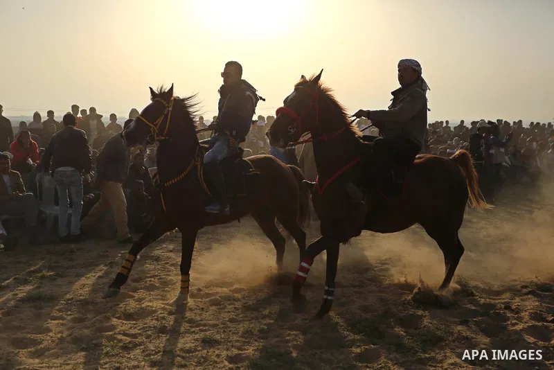 Palestinian Bedouins ride horses during a rally marking the 41st anniversary of Land Day, in Deir el-Balah, Central Gaza Strip, on March 31, 2017. Land Day marks the killing of six Arab Israelis during 1976 demonstration...