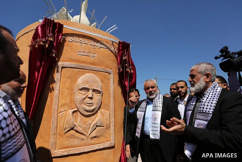 Senior political leaders of the Islamist movement, Ismail Haniyeh attends the opening ceremony of monument of Palestinian prisoners held in Israeli jails, in the northwest of Gaza city on April 01, 2017. Photo by Ashraf...