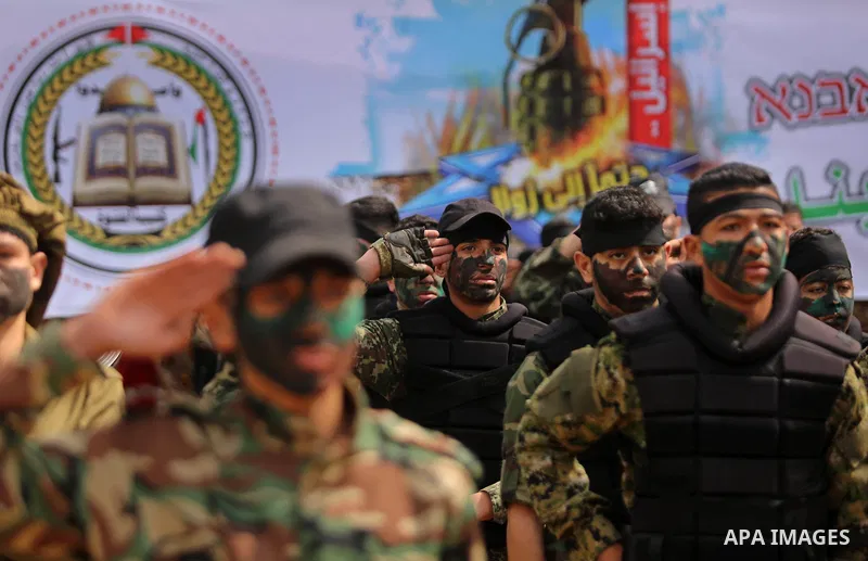 Palestinian high-school students show off their skills during a graduation ceremony from a military school course organised by the Palestinian security forces in Gaza strip, in Gaza City, on April 2, 2017. Photo by Ashra...