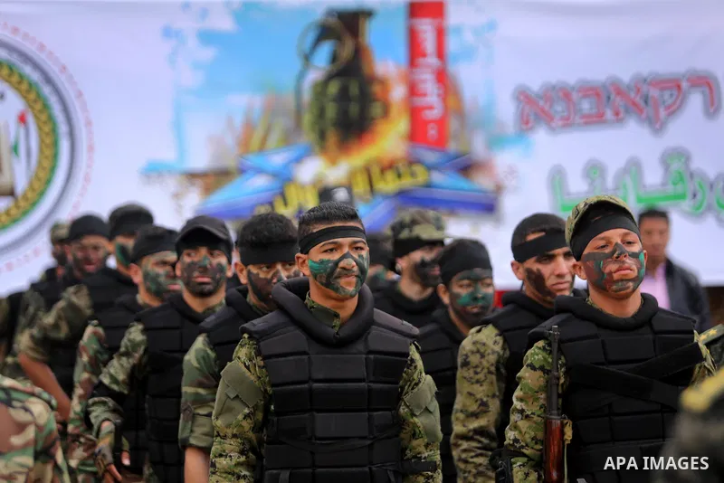 Palestinian high-school students show off their skills during a graduation ceremony from a military school course organised by the Palestinian security forces in Gaza strip, in Gaza City, on April 2, 2017. Photo by Ashra...