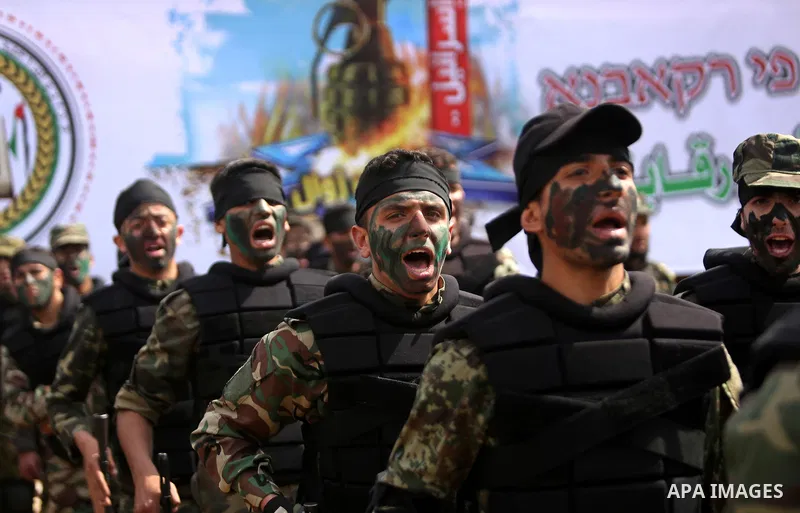 Palestinian high-school students show off their skills during a graduation ceremony from a military school course organised by the Palestinian security forces in Gaza strip, in Gaza City, on April 2, 2017. Photo by Ashra...