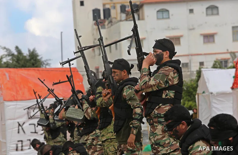 Palestinian high-school students show off their skills during a graduation ceremony from a military school course organised by the Palestinian security forces in Gaza strip, in Gaza City, on April 2, 2017. Photo by Ashra...