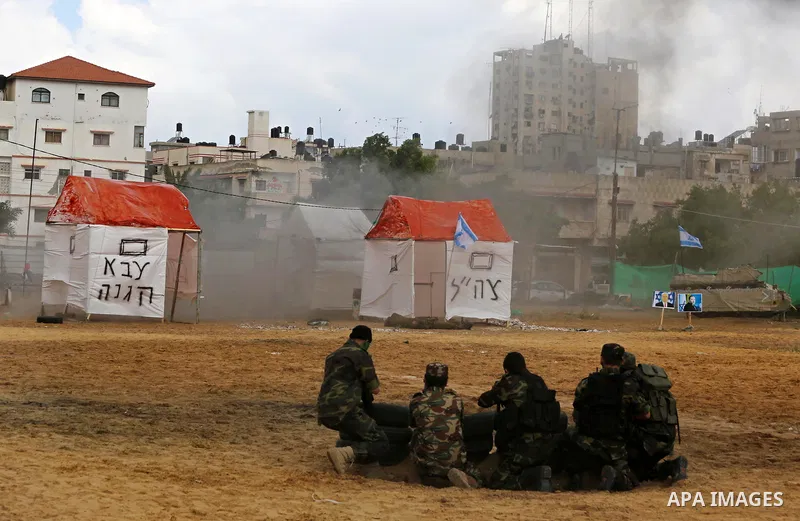 Palestinian high-school students show off their skills during a graduation ceremony from a military school course organised by the Palestinian security forces in Gaza strip, in Gaza City, on April 2, 2017. Photo by Ashra...