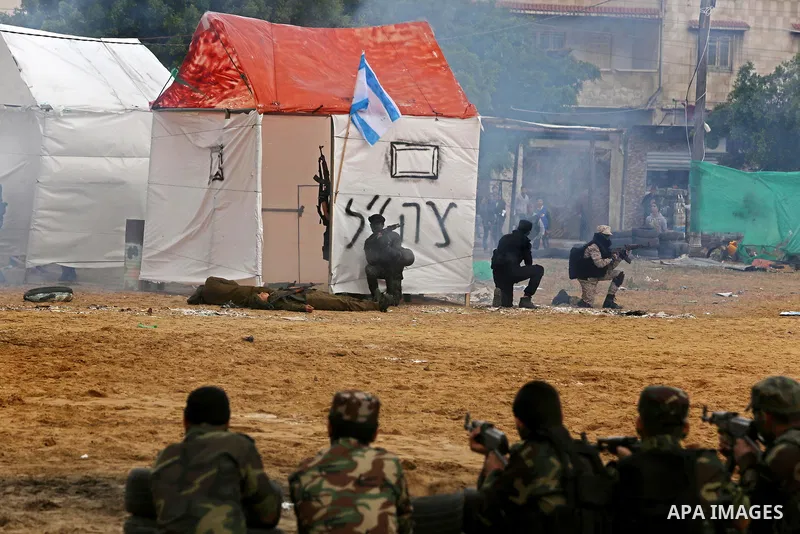 Palestinian high-school students show off their skills during a graduation ceremony from a military school course organised by the Palestinian security forces in Gaza strip, in Gaza City, on April 2, 2017. Photo by Ashra...