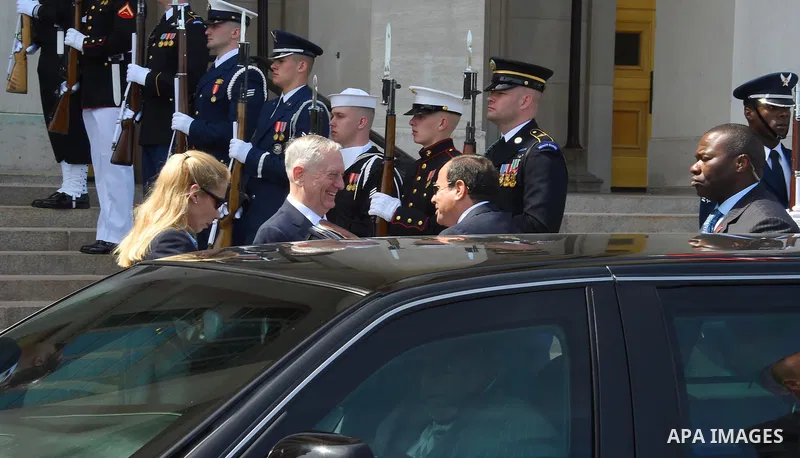 US Defense Secretary James Mattis and Egypt's President Abdel Fattah al-Sisi listen to national anthems during a welcome ceremony as al-Sisi arrives for meetings at the Pentagon, in Washington, United States on April 5,...