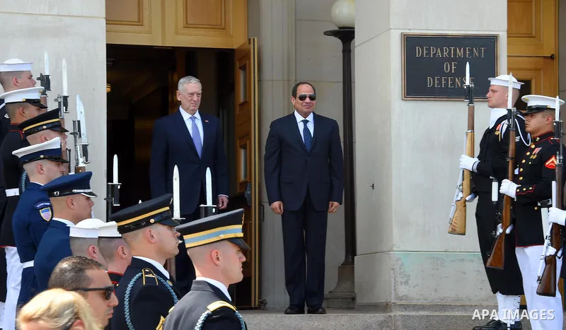 US Defense Secretary James Mattis and Egypt's President Abdel Fattah al-Sisi listen to national anthems during a welcome ceremony as al-Sisi arrives for meetings at the Pentagon, in Washington, United States on April 5,...
