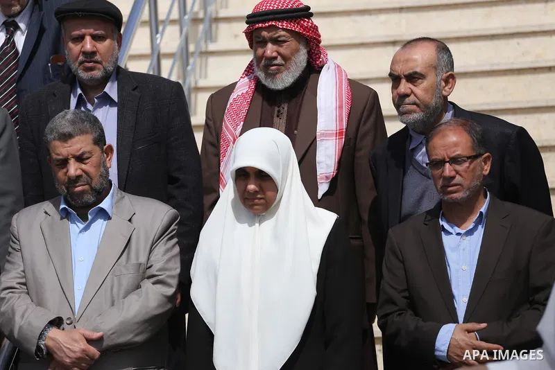 Palestinian Members of the Legislative council take part in a protest in Gaza city, on April 9, 2017. Photo by Mohammed Asad