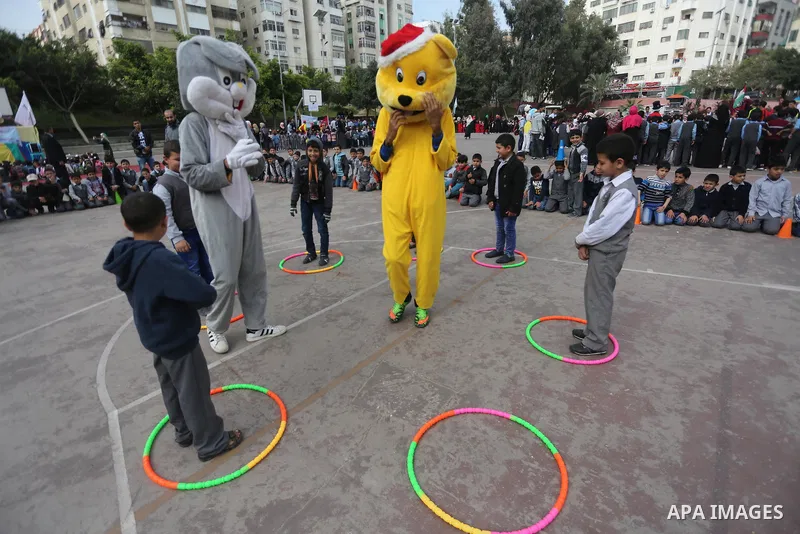 Palestinian children take part in the Palestine Children's Festival in Gaza City, on April 9, 2017. Photo by Mohammed Asad