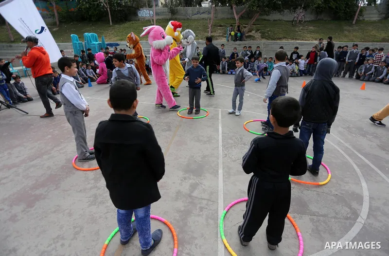Palestinian children take part in the Palestine Children's Festival in Gaza City, on April 9, 2017. Photo by Mohammed Asad