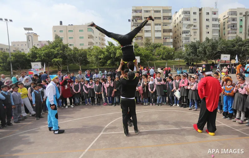 Palestinian children take part in the Palestine Children's Festival in Gaza City, on April 9, 2017. Photo by Mohammed Asad