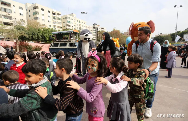 Palestinian children take part in the Palestine Children's Festival in Gaza City, on April 9, 2017. Photo by Mohammed Asad