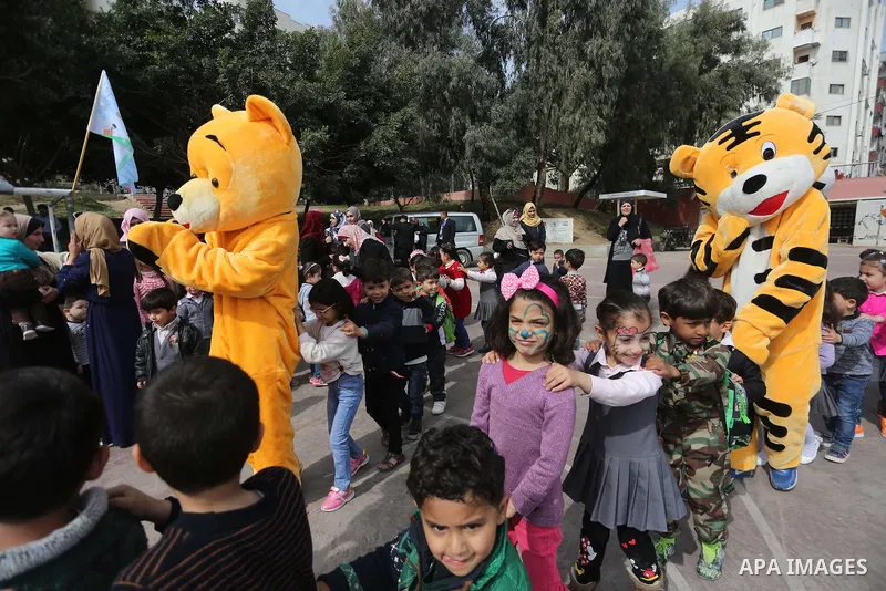 Palestinian children take part in the Palestine Children's Festival in Gaza City, on April 9, 2017. Photo by Mohammed Asad