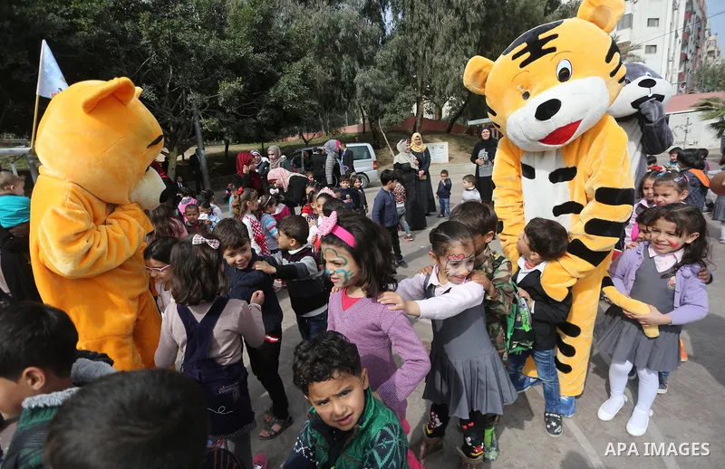 Palestinian children take part in the Palestine Children's Festival in Gaza City, on April 9, 2017. Photo by Mohammed Asad