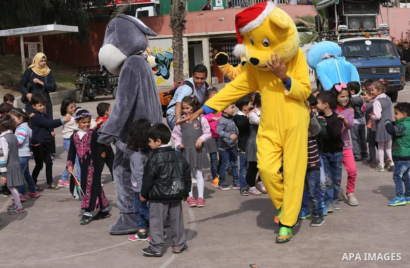 Palestinian children take part in the Palestine Children's Festival in Gaza City, on April 9, 2017. Photo by Mohammed Asad