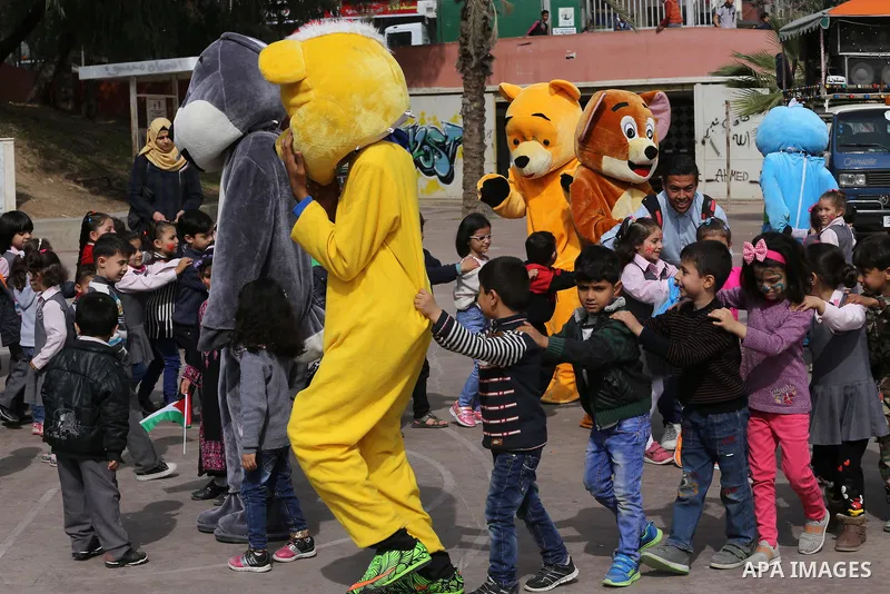 Palestinian children take part in the Palestine Children's Festival in Gaza City, on April 9, 2017. Photo by Mohammed Asad