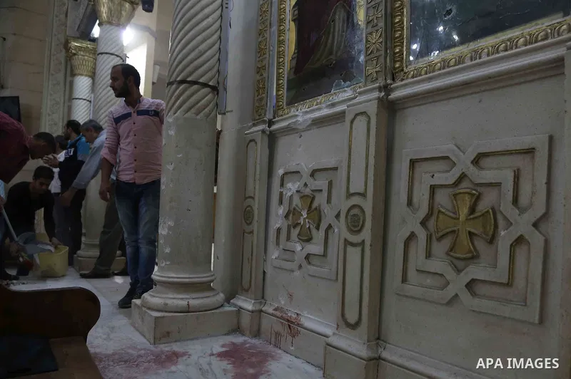 A picture taken on April 9, 2017 shows a general view of the destruction, debris, and blood stains on the benches of the Mar Girgis Coptic Orthodox Church in the Nile Delta City of Tanta, 120 kilometres (75 miles) north...