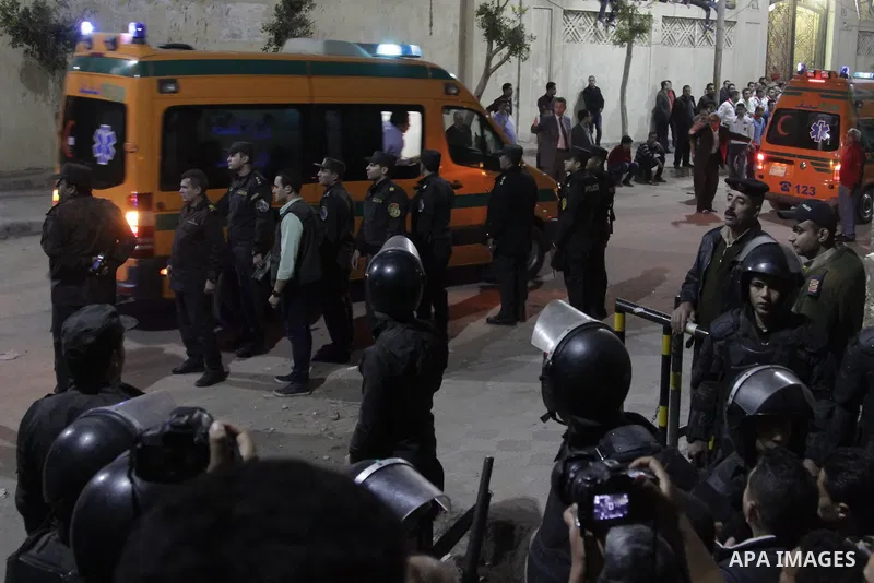 An ambulance arrives to the site of a bomb blast that took place on Sunday in the Mar Girgis Coptic Orthodox Church that was bombed on Sunday in the Nile Delta City of Tanta, 120 kilometres (75 miles) north of Cairo, at...