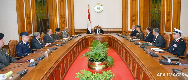 Egyptian President Abdel Fattah al-Sisi and members of the national defense council mourn for the victims of Sunday's two church attacks, in Cairo April 9, 2017. Abdel-Fattah al-Sisi on Sunday evening declared a three-mo...