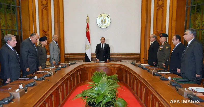 Egyptian President Abdel Fattah al-Sisi and members of the national defense council mourn for the victims of Sunday's two church attacks, in Cairo April 9, 2017. Abdel-Fattah al-Sisi on Sunday evening declared a three-mo...