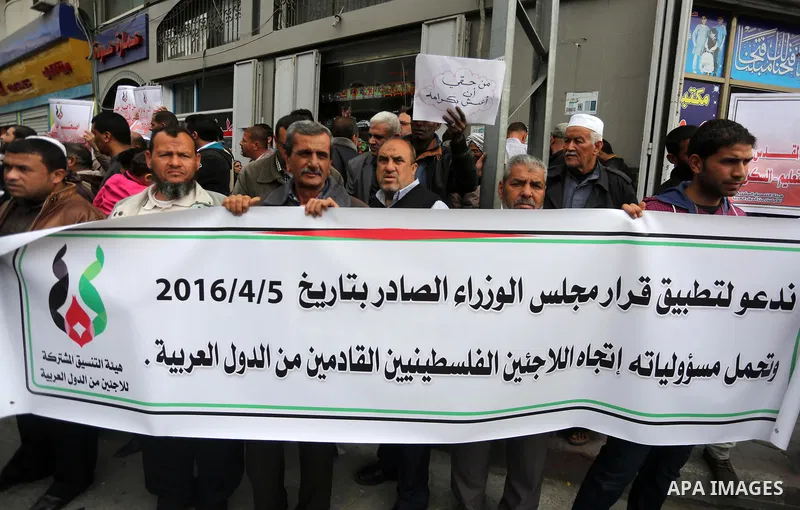 Palestinian refugees from Syrian, Yemen, Libya, take part in a protest in Gaza city on April 10, 2017. Photo by Mohammed Asad