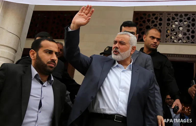Senior political leaders of the Islamist movement, Ismail Haniyeh attends the opening ceremony of Sheikh Hamad's mosque, in Khan Younis in the southern Gaza strip, on April 10, 2017. Photo by Ashraf Amra