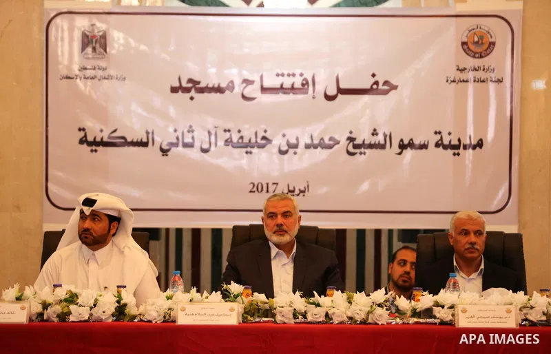 Senior political leaders of the Islamist movement, Ismail Haniyeh attends the opening ceremony of Sheikh Hamad's mosque, in Khan Younis in the southern Gaza strip, on April 10, 2017. Photo by Ashraf Amra