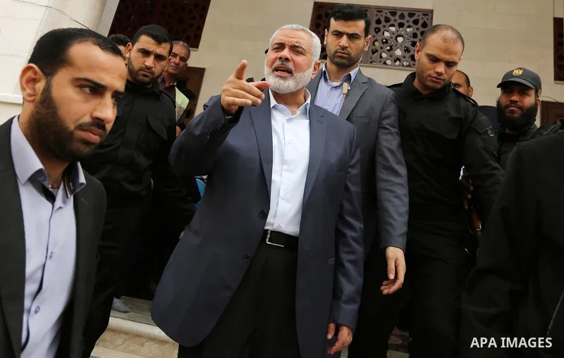 Senior political leaders of the Islamist movement, Ismail Haniyeh attends the opening ceremony of Sheikh Hamad's mosque, in Khan Younis in the southern Gaza strip, on April 10, 2017. Photo by Ashraf Amra