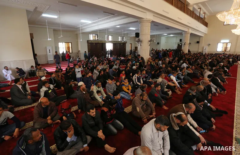 Palestinians attend the opening ceremony of Sheikh Hamad's mosque, in Khan Younis in the southern Gaza strip, on April 10, 2017. Photo by Ashraf Amra