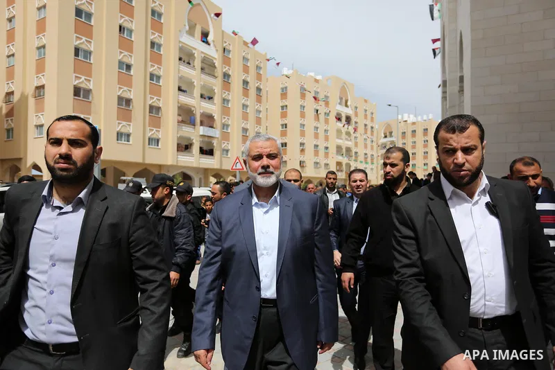 Senior political leaders of the Islamist movement, Ismail Haniyeh attends the opening ceremony of Sheikh Hamad's mosque, in Khan Younis in the southern Gaza strip, on April 10, 2017. Photo by Ashraf Amra