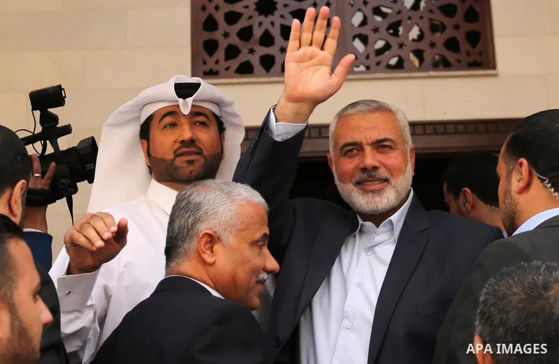 Senior political leaders of the Islamist movement, Ismail Haniyeh attends the opening ceremony of Sheikh Hamad's mosque, in Khan Younis in the southern Gaza strip, on April 10, 2017. Photo by Ashraf Amra