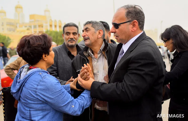 Egyptian Christians mourn for the victims of the blast at the Coptic Christian Saint Mark's church in Alexandria the previous day during a funeral procession at the Monastery of Marmina in the city of Borg El-Arab, east...
