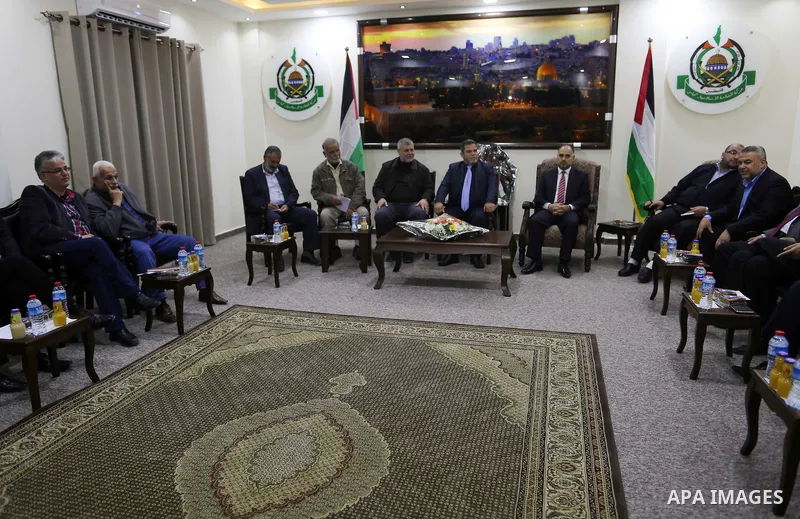 Palestinian leaders attend a meeting in Gaza city, on April 12, 2017. Photo by Ashraf Amra