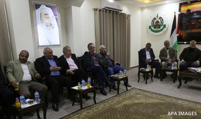Palestinian leaders attend a meeting in Gaza city, on April 12, 2017. Photo by Ashraf Amra