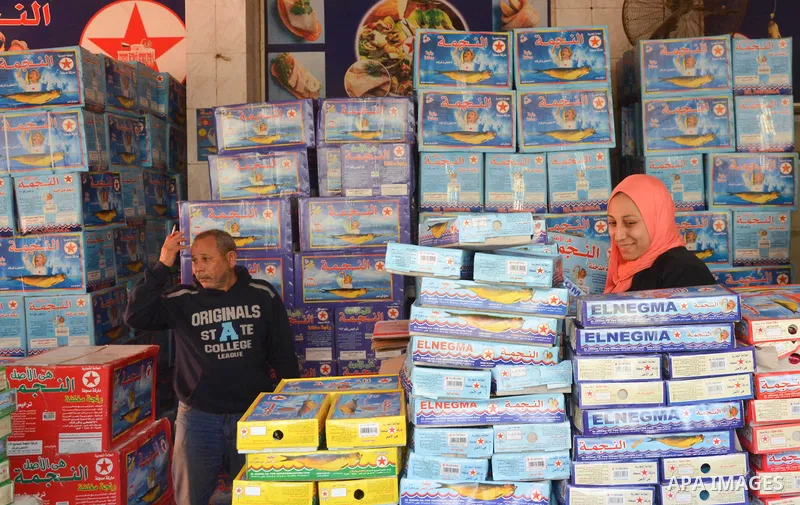 Egyptians buy the Herring or, salted fish during preparation for the upcoming the Sham El Nessim, or the Festival of Spring Breeze, which marks the beginning of spring, in Cairo, on April 14, 2017. Photo by Amr Sayed