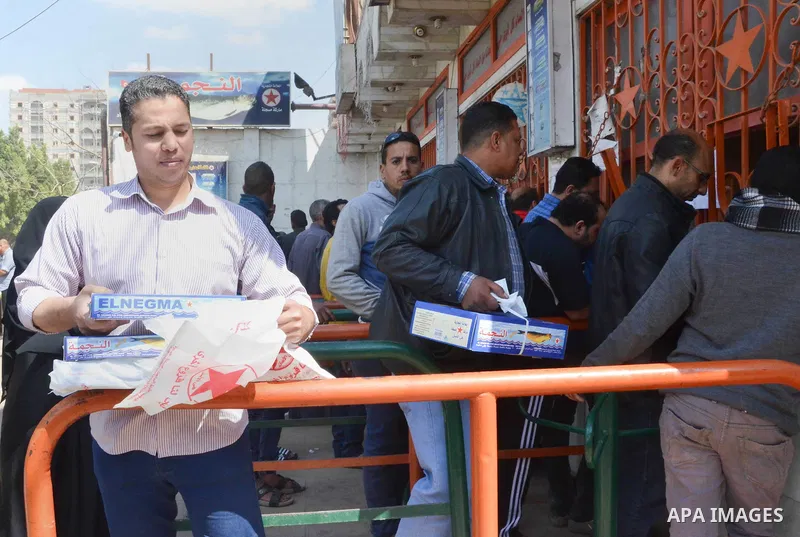 Egyptians buy the Herring or, salted fish during preparation for the upcoming the Sham El Nessim, or the Festival of Spring Breeze, which marks the beginning of spring, in Cairo, on April 14, 2017. Photo by Amr Sayed