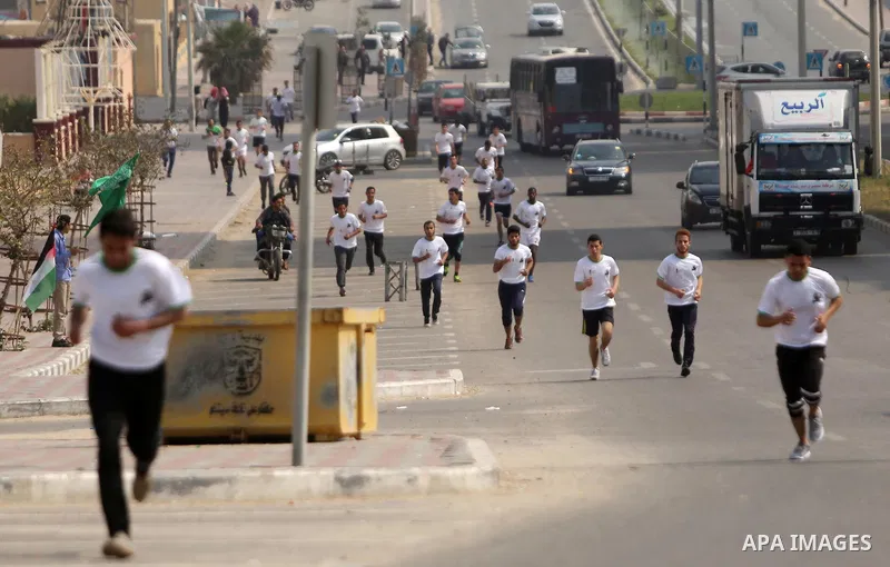 Palestinian youths take part in "Freedom Marathon" against the Israeli blockade of the Gaza Strip, in Gaza city on April 15, 2017. Photo by Ashraf Amra