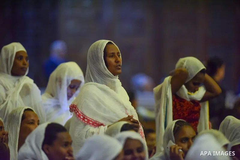 Egyptian Coptic Christians take part in an Easter Eve mass hosted by Pope Tawadros II at the St. Mark church in Cairo April 15, 2017. Photo by Amr Sayed